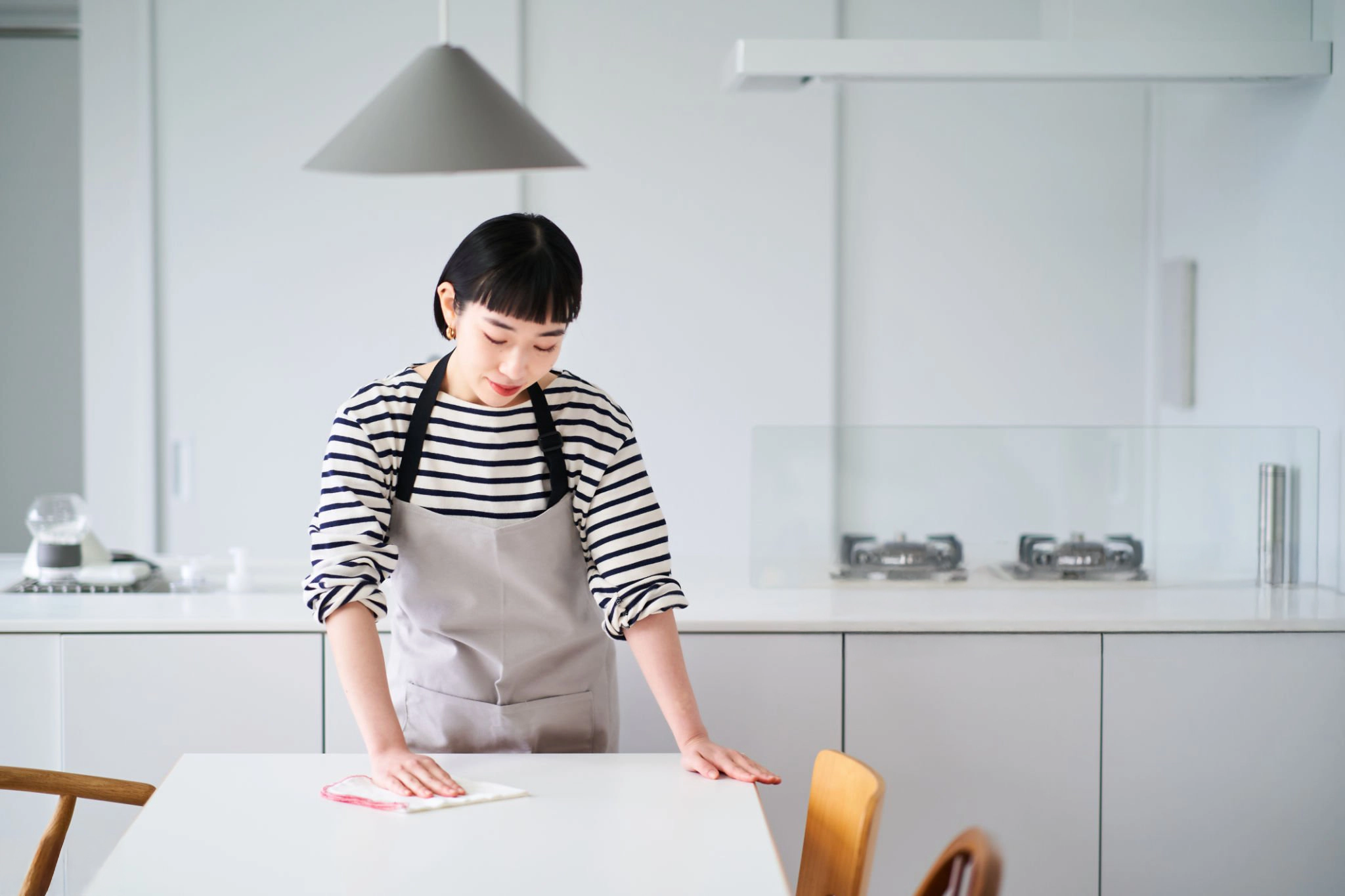 women cleaning dining table