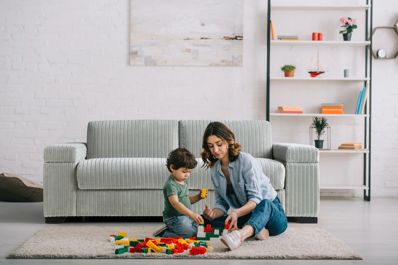 woman playing with child